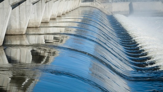 Water flowing over a dam