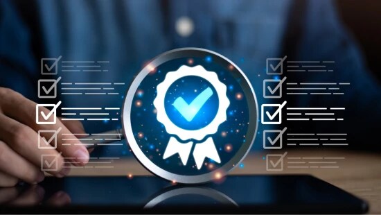 Individual typing on laptop with digital pop up of checkmark.